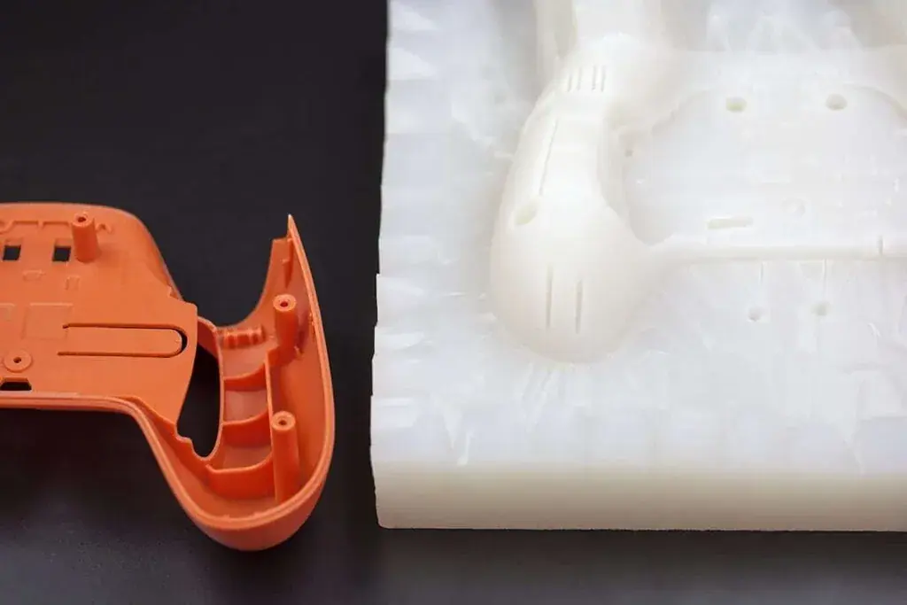 Vacuum-cast-part-next-to-its-silicone-mould